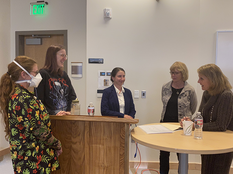 Nancy Gray chatting with seminar guests