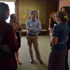 Matt Sigman talking with award-winning students at the dinner