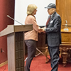 Cindy Burrows shakes hands with Sung Wan Kim