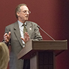 Milton Lee speaks to the dinner guests